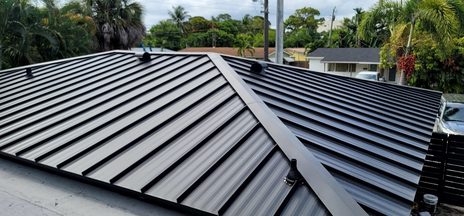 Brown metal roof installation in Fort Lauderdale by Planet Roofing